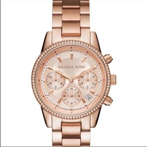 Brand new Micheal Kors rose gold watch